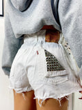 Short Levi’s Vintage bianco con borchie