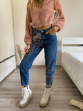 Jeans con borchie