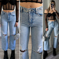 Jeans con strappi e strass