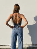 Jeans con catene argento