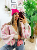 Cardigan maculato rosa con gioiello
