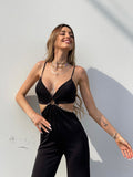 Tuta lunga nera con catena
