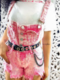 Salopette in jeans rosa sfrangiata