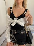 Jeans nero con borchie