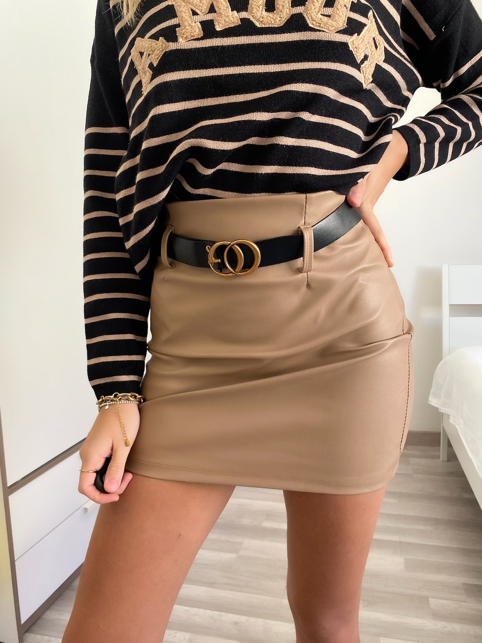 Gonna in ecopelle con cintura nude