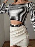 Gonna in ecopelle con zip laterale bianca