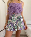 Top con piume lilla