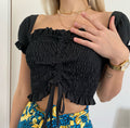 Top crop arricciato con manichina nero