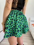 Completo giacca e Short maculato verde