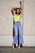 Top verde con anelli oro