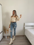 Maglia crema con apertura