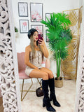 Top beige con catena