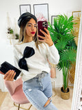 Maglione con fiocco e strass