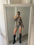 Tutina animalier con manicotti