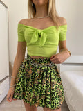 Top lime scollo a barchetta e fiocco