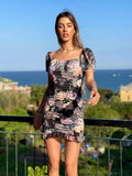 Abito a fiori nero manica corta