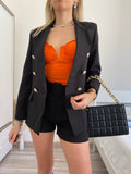 Completo giacca con bottoni e short nero