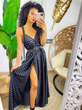 Abito in raso con maxi spacco nero a pois