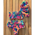Bikini monospalla con rouge vita alta floreale