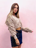 Cardigan panna a trecce