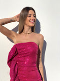 Abito Fuxia con paillettes e maxi Rouches