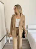 Completo giacca e pantalone beige