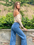 Top beige morbido con scollo