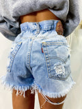 Short Levi’s Vintage bagno chiaro con strappi