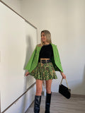 Giacca verde con bottoni oro