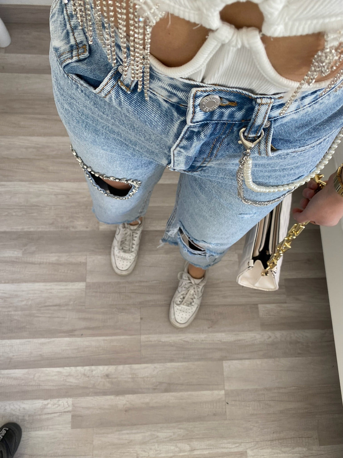 Jeans con cuore e strass