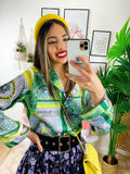 Camicia fiorata base verde