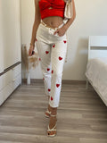 Jeans bianco cuori rossi