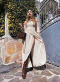 Abito lungo con scollo a barchetta beige