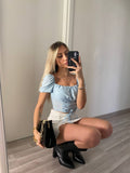 Top celeste manica corta con lacci