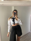 Gonna con rosa e camicia