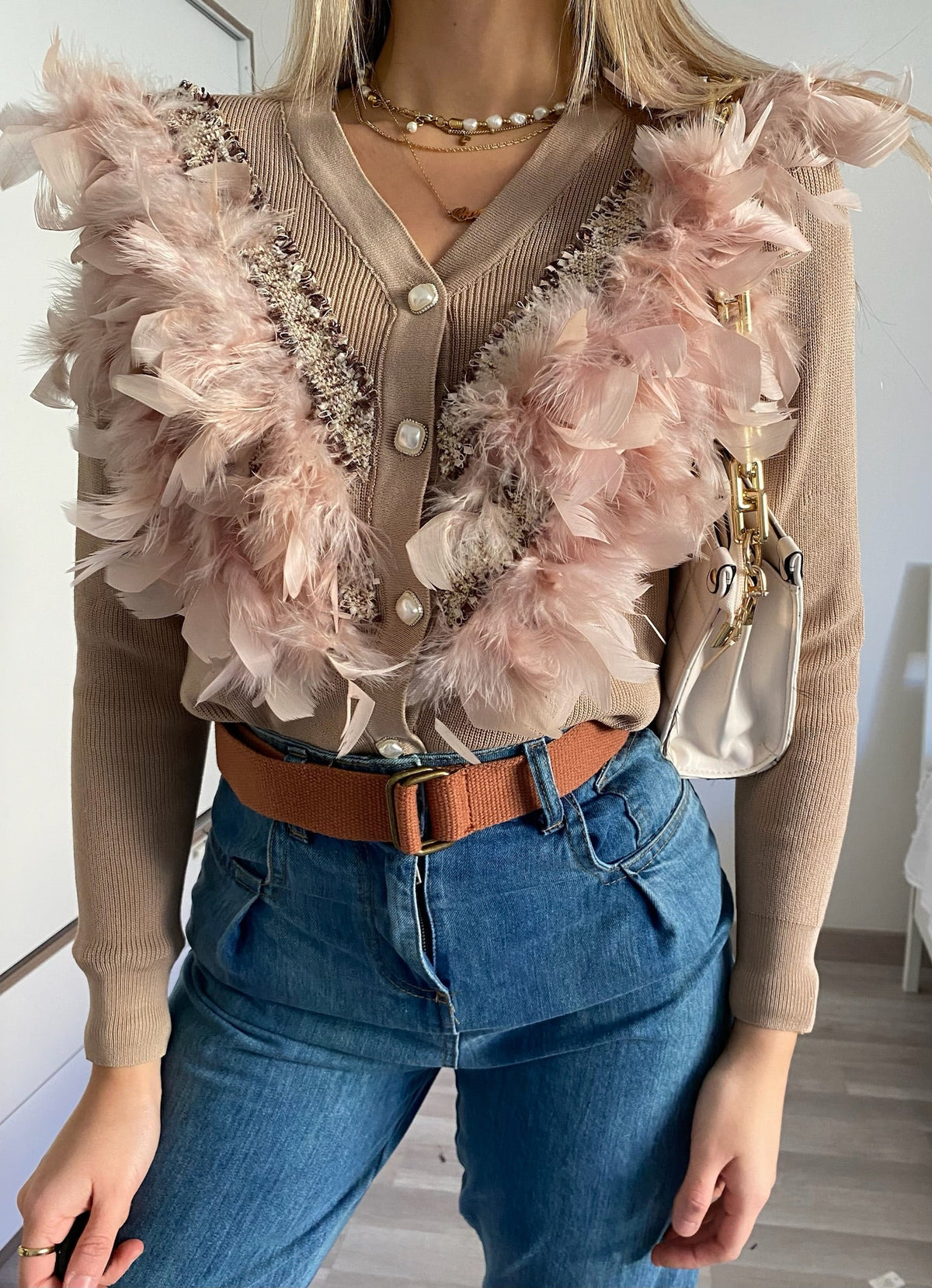 Maglione Nude con piume