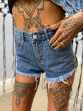 Short jeans borchie e patch