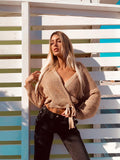 Cardigan con cinta in vita