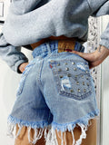 Short Levi’s Vintage bagno chiaro con borchie