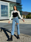 Jeans con strass e cuore