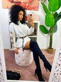 Abito in maglia con fiocchetti e paillettes