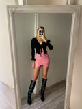 Gonna in ecopelle con zip laterale rosa