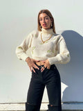 Maglione collo alto con rose Panna