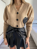 Maglione camel con cuore in pelle