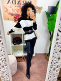 Maglione a righe bianco e nero
