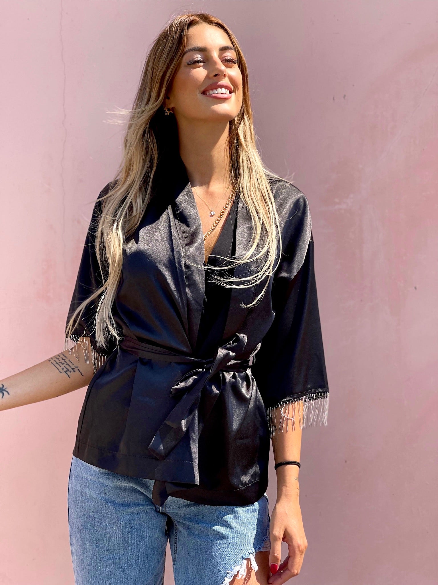Blusa o kimono con frange