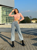 Jeans con spacchi superiori