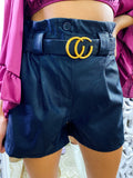 Short in ecopelle con cintura
