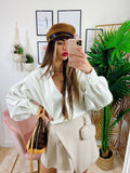 Short beige con marsupio