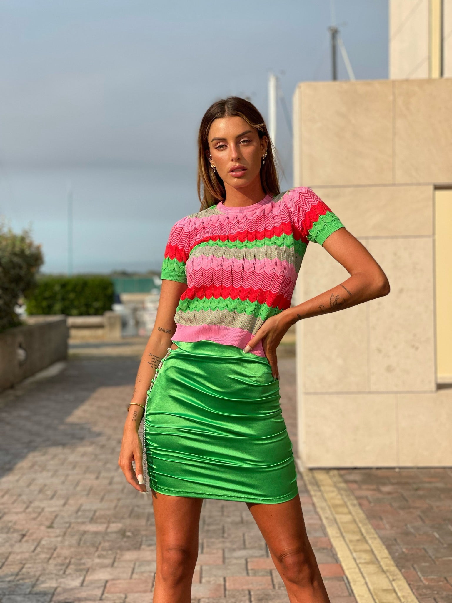 Maglia rosa e verde con cuori